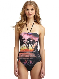 THE LOOKHalter straps ruche at center bust and tie at neckTropical palm printPadded cupsLogo-embossed button at sideBack clasp closureCutout backTHE MATERIAL80% nylon/20% spandexFully linedCARE & ORIGINHand washImported