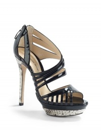 THE LOOKAsymmetrical patent leather strapsCutout detailingOpen toeBack zipperPadded insolePython heel, 5 (125mm)Patent leather & python platform, 1½ (40mm)Compares to a 3½ heel (90mm)THE MATERIALPatent leather upperPython heel and platformLeather lining and soleORIGINMade in Italy THE LOOKAsymmetrical patent leather strapsCutout detailingOpen toeBack zipperPadded insolePython heel, 5 (125mm)Patent leather & python platform, 1½ (40mm)Compares to a 3½ heel (90mm)THE MATERIALPatent leather upperPython heel and platformLeather lining and soleORIGINMade in Italy