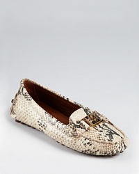 A classic driver shoe gets an exotic update in python printed leather. From Tory Burch. A classic driver shoe gets an exotic update in python printed leather. From Tory Burch.