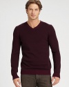 The perfect option for transitional weather, this versatile v-neck, shaped in a luxurious wool and cashmere blend, can be worn alone, or layered, as those cold weather days approach.V-neckRibbed collar, cuffs and hem70% wool/30% cashmereHand washImported