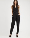 A stunning silhouette rendered in rich wool suiting with standout details like a sheer back panel, front pleats and flattering tapered legs.V-neckWrap frontSleevelessPull-on style with belted waistSide slash pocketsRise, about 9½Inseam, about 30About 64 from shoulder to hemFully linedWoolDry cleanImportedModel shown is 5'10 (177cm) wearing US size 4. 