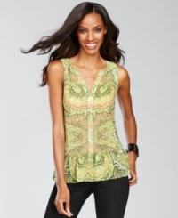 Try out the silhouette of the season -- the peplum -- with INC's exotic print top. A charming addition to any wardrobe. Try out the silhouette of the season -- the peplum -- with INC's exotic print top. A charming addition to any wardrobe.