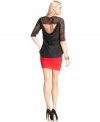 An open back and sheer lace ups the sultry quotient on this BCBGMAXAZRIA top -- perfect for hot soiree style!