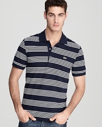 A clean-cut look for lunch with the in-laws, or when you need to polish up a weekend afternoon, this Lacoste polo is a surefire winner. A clean-cut look for lunch with the in-laws, or when you need to polish up a weekend afternoon, this Lacoste polo is a surefire winner.