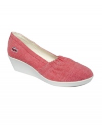 Kick back in Lacoste's easygoing sneaks. The Arlesia features a subtle wedge and cool slip-on design perfect for weekend wear. Kick back in Lacoste's easygoing sneaks. The Arlesia features a subtle wedge and cool slip-on design perfect for weekend wear.