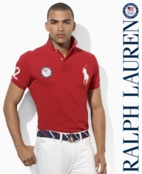 A trim-fitting short-sleeved polo shirt is rendered in breathable cotton mesh with bold country embroidery, celebrating Team USA's participation in the 2012 Olympics. A trim-fitting short-sleeved polo shirt is rendered in breathable cotton mesh with bold country embroidery, celebrating Team USA's participation in the 2012 Olympics.