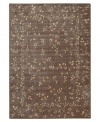 A beautiful lattice of delicate vines and blooming flowers gives this rug its magnetic charm. On a dark khaki ground with soft ivory accents, this densely woven piece invites you into wonderful interior decor.