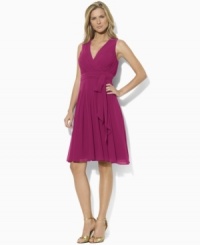 Imbued with ethereal elegance in a whimsical design of airy georgette, this Lauren by Ralph Lauren dress defines enchanting style with its soft shirring and full, pleated skirt. Imbued with ethereal elegance in a whimsical design of airy georgette, this Lauren by Ralph Lauren dress defines enchanting style with its soft shirring and full, pleated skirt.