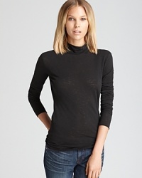 This rag & bone/JEAN polo tee is a fall layering essential. Top with a chic fur vest for luxe style. This rag & bone/JEAN polo tee is a fall layering essential. Top with a chic fur vest for luxe style.