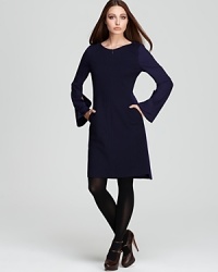 This season's statement pieces prove that shape and geometry are the new tenets of style. Touting geometric color blocking accentuated by exaggerated sleeves, this Elie Tahari dress is so right for right now. This season's statement pieces prove that shape and geometry are the new tenets of style. Touting geometric color blocking accentuated by exaggerated sleeves, this Elie Tahari dress is so right for right now.