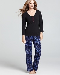 Flannel pajamas take a wild turn with this comfy, bed-ready set from Betsey Johnson. Flannel pajamas take a wild turn with this comfy, bed-ready set from Betsey Johnson.