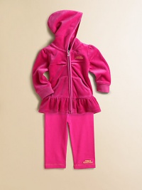 This adorable, coordinating set includes a zip-front hoodie with ruffled hem and matching sweatpants for a sporty, yet girly, ensemble. Hoodie Attached hoodLong sleevesFull-zip frontRibbed cuffs and hemSplit kangaroo pocketRuffled hem Pants Elastic waistband94% cotton/6% spandexMachine washImported This adorable, coordinating set includes a zip-front hoodie with ruffled hem and matching sweatpants for a sporty, yet girly, ensemble. Hoodie Attached hoodLong sleevesFull-zip frontRibbed cuffs and hemSplit kangaroo pocketRuffled hem Pants Elastic waistband94% cotton/6% spandexMachine washImported