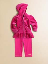 This adorable, coordinating set includes a zip-front hoodie with ruffled hem and matching sweatpants for a sporty, yet girly, ensemble. Hoodie Attached hoodLong sleevesFull-zip frontRibbed cuffs and hemSplit kangaroo pocketRuffled hem Pants Elastic waistband94% cotton/6% spandexMachine washImported