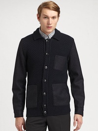 Chunky cardigan sweater knitted in superior wool with contrasting fabric sleeves for a handsomely modern finish.Button-frontChest, waist patch pocketsRibbed knit hemWoolDry cleanMade in Italy Chunky cardigan sweater knitted in superior wool with contrasting fabric sleeves for a handsomely modern finish.Button-frontChest, waist patch pocketsRibbed knit hemWoolDry cleanMade in Italy