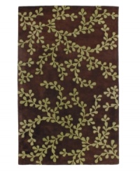 A lush pattern of lime-green leaves stretch across the rich brown background of this high-contrast area rug from Surya. Hand-tufted from poly-acrylic fibers that provide luxurious softness without shedding, this rug adds a striking, easy-maintenance accent to any living space. A lush pattern of lime-green leaves stretch across the rich brown background of this high-contrast area rug from Surya. Hand-tufted from poly-acrylic fibers that provide luxurious softness without shedding, this rug adds a striking, easy-maintenance accent to any living space.