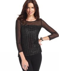 NY Collection's top features sheer details and a textured metallic finish to add a touch of shimmer to an evening ensemble. NY Collection's top features sheer details and a textured metallic finish to add a touch of shimmer to an evening ensemble.