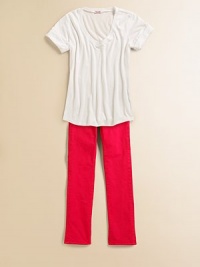 Rendered in super-soft, lightweight fabric, this wardrobe staple will match everything.V-neck collarShort sleeves with roll-up cuffsButton front50% cotton/50% modalMachine washImported Rendered in super-soft, lightweight fabric, this wardrobe staple will match everything.V-neck collarShort sleeves with roll-up cuffsButton front50% cotton/50% modalMachine washImported