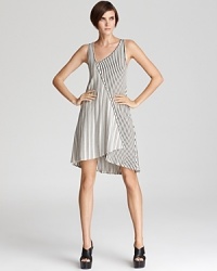 Cut a striking asymmetrical silhouette in this boldly striped Patterson J. Kincaid dress. Cut a striking asymmetrical silhouette in this boldly striped Patterson J. Kincaid dress.