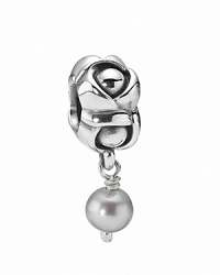 A sterling silver floral charm with an elegant grey freshwater pearl. By PANDORA. A sterling silver floral charm with an elegant grey freshwater pearl. By PANDORA.
