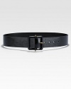 A patent leather style with stud detailing on the buckle. Black leatherShiny brass hardwareSits on the waistLeather covered square buckle with cone-shaped studsWidth, about 2Made in Italy