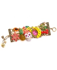Isn't she charming? Betsey Johnson combines a white skull with fruit accents, including pineapple, yellow bananas, red cherries, orange papaya, and red flowers. A purple and green snake and colorful crystal accents top it all off. Setting and toggle clasp crafted in antique gold-plated mixed metal. Approximate length: 7-1/2 inches. Isn't she charming? Betsey Johnson combines a white skull with fruit accents, including pineapple, yellow bananas, red cherries, orange papaya, and red flowers. A purple and green snake and colorful crystal accents top it all off. Setting and toggle clasp crafted in antique gold-plated mixed metal. Approximate length: 7-1/2 inches.