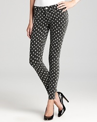 Lively, retro-inspired polka dots energize these Paige Denim skinny jeans--color washed for a chic alternative to everyday denim with added stretch for leg-hugging flair and flattery. Lively, retro-inspired polka dots energize these Paige Denim skinny jeans--color washed for a chic alternative to everyday denim with added stretch for leg-hugging flair and flattery.