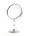 Definitely the fairest of them all, the double Crystal Ball mirror rotates 360 degrees to get every angle and, when you flip it over, magnify your beauty. A brilliant chrome finish and faceted detail add glamor to your daily routine.