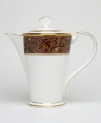 Add drama to your tabletop with this bold pattern from Noritake! Strikingly elegant, this bone china features a rich gold and red brocade border adorned with soft ivory dots and a gold band. Add drama to your tabletop with this bold pattern from Noritake! Strikingly elegant, this bone china features a rich gold and red brocade border adorned with soft ivory dots and a gold band.
