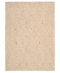 Diamond cut. A distinctive all-over diamond design and soft beige background evoke the rings from the trunk of an ancient tree. Hand tufted from 100% natural wool, this plush Calvin Klein area rug is crafted using the cut-and-loop pile technique that creates a unique matte surface texture. Diamond cut. A distinctive all-over diamond design and soft beige background evoke the rings from the trunk of an ancient tree. Hand tufted from 100% natural wool, this plush Calvin Klein area rug is crafted using the cut-and-loop pile technique that creates a unique matte surface texture.