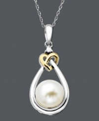 Adorn yourself in timeless design. A chic teardrop setting in sterling silver cradles a smooth cultured freshwater pearl (8 mm) and diamond accent. A touch of luxury is added with a rich 14k gold heart. Approximate length: 18 inches. Approximate drop: 3/4 inch. Adorn yourself in timeless design. A chic teardrop setting in sterling silver cradles a smooth cultured freshwater pearl (8 mm) and diamond accent. A touch of luxury is added with a rich 14k gold heart. Approximate length: 18 inches. Approximate drop: 3/4 inch.