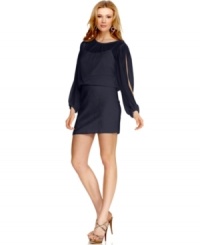 Split sleeves give Xscape's dress a sleek personality! Pair with strappy heels and sparkling earrings for an ensemble that's ready for evening. Split sleeves give Xscape's dress a sleek personality! Pair with strappy heels and sparkling earrings for an ensemble that's ready for evening.