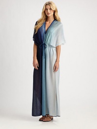Those legendary knitters turn their attention to a long, light sheer caftan with tonal ombré shading and a subtle shimmer.V necklineShort, wide dolman sleevesDrawstring waistAbout 62 from shoulder to hemRayon/cotton/polyesterDry cleanMade in ItalySIZE & FITModel shown is 5'10 (177cm) wearing US size Small. Those legendary knitters turn their attention to a long, light sheer caftan with tonal ombré shading and a subtle shimmer.V necklineShort, wide dolman sleevesDrawstring waistAbout 62 from shoulder to hemRayon/cotton/polyesterDry cleanMade in ItalySIZE & FITModel shown is 5'10 (177cm) wearing US size Small.