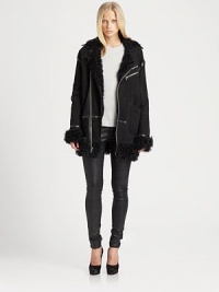 Soft, aviator-inspired leather jacket, defined by plush shearling, contrast trim and a length that hits below the hips.