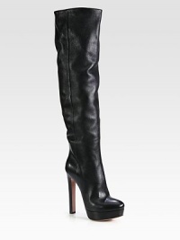 Tall leather silhouette with a side zip and high stacked heel. Stacked heel, 5½ (140mm)Covered platform, 1½ (40mm)Compares to a 4 heel, (100mm)Shaft, 20Leg circumference, 14Leather upperSide zipLeather liningLeather and rubber solePadded insoleMade in Italy Tall leather silhouette with a side zip and high stacked heel. Stacked heel, 5½ (140mm)Covered platform, 1½ (40mm)Compares to a 4 heel, (100mm)Shaft, 20Leg circumference, 14Leather upperSide zipLeather liningLeather and rubber solePadded insoleMade in Italy