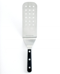 A seasoned pro! Have the tools to take on the kitchen and conquer cooking. Durable and versatile, this oversized turner is crafted from one piece of strong stainless steel with a rounded comfort grip and long handle to meet every task with ease and excellence. A seasoned pro! Have the tools to take on the kitchen and conquer cooking. Durable and versatile, this oversized turner is crafted from one piece of strong stainless steel with a rounded comfort grip and long handle to meet every task with ease and excellence.