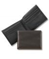 Soft and luxurious sheepskin lines this sophisticated wallet from Tasso Elba.