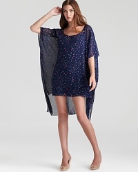 Mara Hoffman's star-printed poncho doubles up for daytime as a dress or swim cover-up. Ditch the slip when beach-bound to flaunt an equally chic bikini. Mara Hoffman's star-printed poncho doubles up for daytime as a dress or swim cover-up. Ditch the slip when beach-bound to flaunt an equally chic bikini.