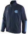 Get fired up! Keep the support of your favorite NCAA basketball team alive with this North Carolina Tar Heels jacket from Nike.
