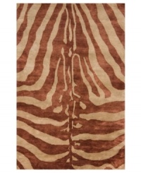 Not your everyday animal print, this distinctive rug interprets a classic motif into a vibrant, contemporary design. The Serengeti rug is hand-tufted of plush wool, creating a durable piece with an incredibly soft hand. Not your everyday animal print, this distinctive rug interprets a classic motif into a vibrant, contemporary design. The Serengeti rug is hand-tufted of plush wool, creating a durable piece with an incredibly soft hand.