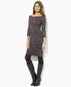 Style and comfort fashionably intertwine in a soft cotton sweater dress with an eye-catching leopard print.