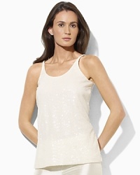 The slinky georgette Tiri camisole is designed with a sequined mesh overlay to lend glamour to an effortlessly sexy essential. The slinky georgette Tiri camisole is designed with a sequined mesh overlay to lend glamour to an effortlessly sexy essential.