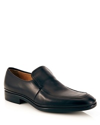 A handsome leather loafer with side gore closure, slightly stacked heel and Bally logo embossed at the upper and sole. A handsome leather loafer with side gore closure, slightly stacked heel and Bally logo embossed at the upper and sole.