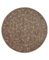 A beautiful lattice of delicate vines and blooming flowers gives this rug its magnetic charm. On a dark khaki ground with soft ivory accents, this densely woven piece invites you into wonderful interior decor.
