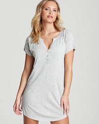 A comfy and casual henley sleepshirt with partial button placket and rounded hem. A comfy and casual henley sleepshirt with partial button placket and rounded hem.