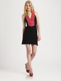 Beaded crochet lends a hand-crafted touch to this top-fit knit styled with shapely pleats from waist to hem.U necklineSleevelessCrocheted bibPleated skirtModified T-backAbout 19 from natural waist37% cotton/8% lycra/32% silk/23% linenDry cleanImportedModel shown is 5'10 (177cm) wearing US size Small. Beaded crochet lends a hand-crafted touch to this top-fit knit styled with shapely pleats from waist to hem.U necklineSleevelessCrocheted bibPleated skirtModified T-backAbout 19 from natural waist37% cotton/8% lycra/32% silk/23% linenDry cleanImportedModel shown is 5'10 (177cm) wearing US size Small.