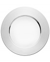 The glint of a stainless steel Sarpaneva plate is a chic surprise amid the standout dinnerware patterns of Iittala.