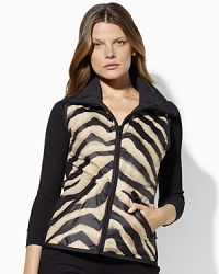 The ingenious reversible design of this sleek microfiber vest creates stylish layering options that are perfect for season-spanning chic. The ingenious reversible design of this sleek microfiber vest creates stylish layering options that are perfect for season-spanning chic.