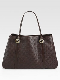 Guccissima leather with interlocking G ornaments, leather trim and nickel hardware.Double top handles, 8 drop Snap closure Protective metal feet Inside zip, cell phone and PDA pockets Fully lined 17¾W X 11¾H X 4D Made in Italy Guccissima leather with interlocking G ornaments, leather trim and nickel hardware.Double top handles, 8 drop Snap closure Protective metal feet Inside zip, cell phone and PDA pockets Fully lined 17¾W X 11¾H X 4D Made in Italy