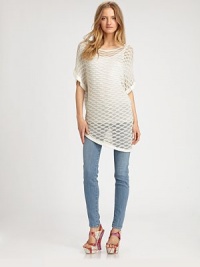 Finished with an asymmetrical hem that hits below the hips, this edgy mesh top completes the look with dropped shoulders and dolman sleeves. BoatneckDropped shouldersThree-quarter dolman sleevesAsymmetrical hem hits below the hips46% viscose/17% nylon/16% metallic/2% angora/2% wool/2% cashmereDry cleanImportedModel shown is 5'10 (177cm) wearing US size Small. Finished with an asymmetrical hem that hits below the hips, this edgy mesh top completes the look with dropped shoulders and dolman sleeves. BoatneckDropped shouldersThree-quarter dolman sleevesAsymmetrical hem hits below the hips46% viscose/17% nylon/16% metallic/2% angora/2% wool/2% cashmereDry cleanImportedModel shown is 5'10 (177cm) wearing US size Small.