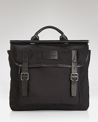 Whether you're hopping on your bike or hoofing it across town, this stylish bag from MARC BY MARC JACOBS easily stores your belongings and reveals your taste for handsome design. Whether you're hopping on your bike or hoofing it across town, this stylish bag from MARC BY MARC JACOBS easily stores your belongings and reveals your taste for handsome design.
